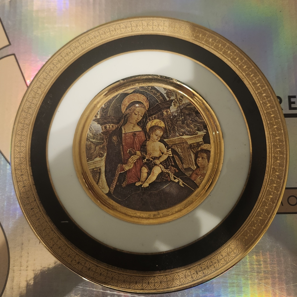 Gold and Black Decorative Plate with Religious Art